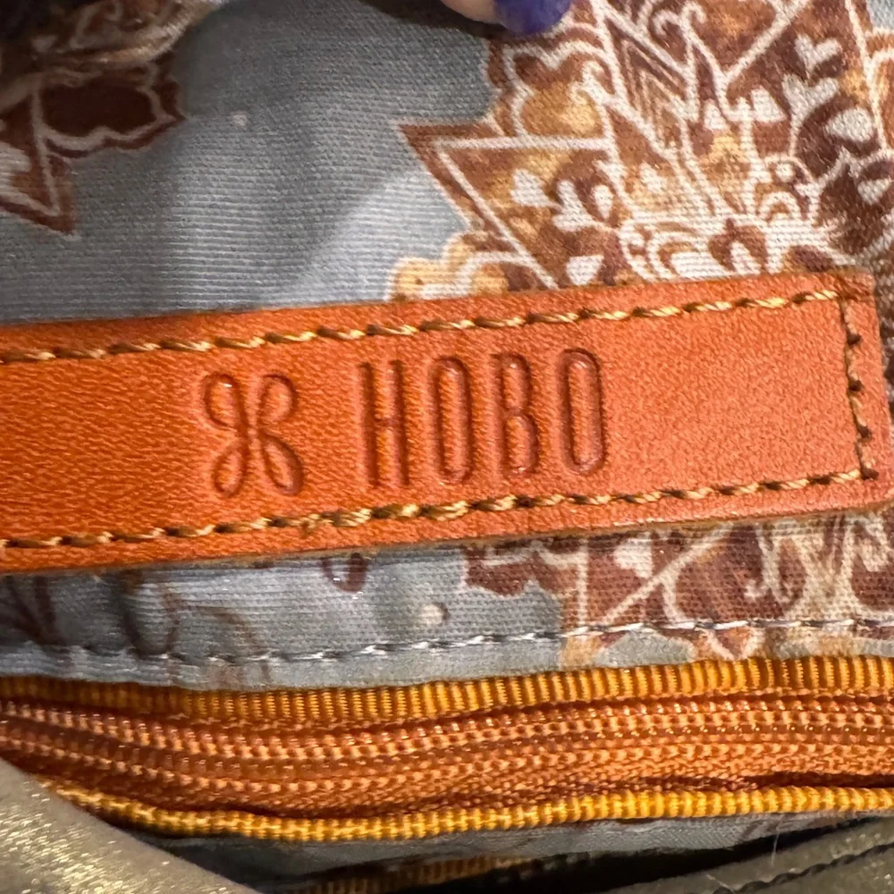 hobo gold shoulder bag
